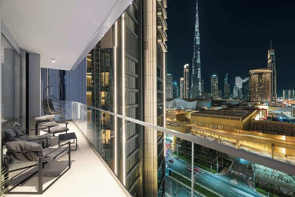 Apartment's balcony offering spectacular views of Dubai’s iconic towers.