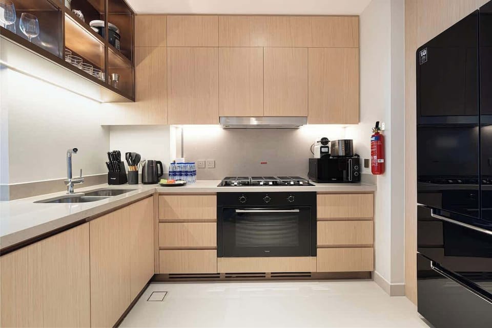 Start your day with a hot beverage from the kettle or toast fresh bread while soaking in the natural light