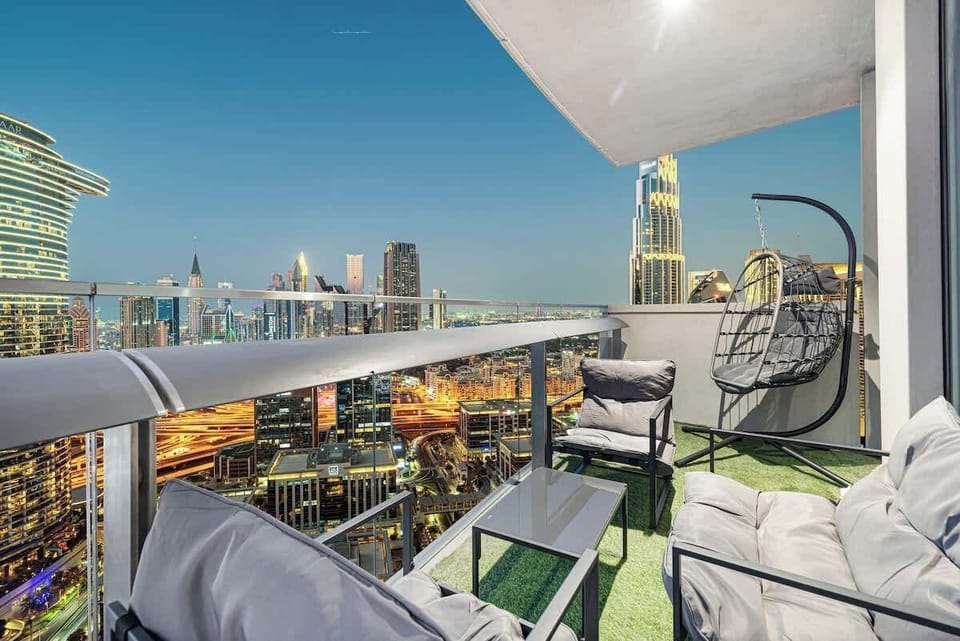Cozy private balcony with a front-row seat to vibrant Downtown