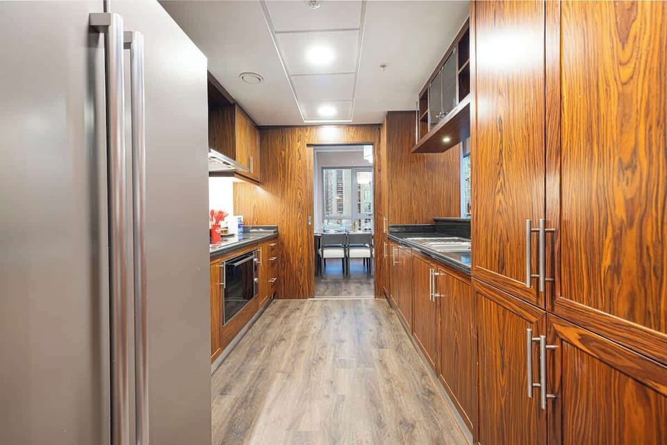 Stainless steel appliances, ample counter space, and all the essentials, designed for spontaneous cooking adventures or relaxing meal prep