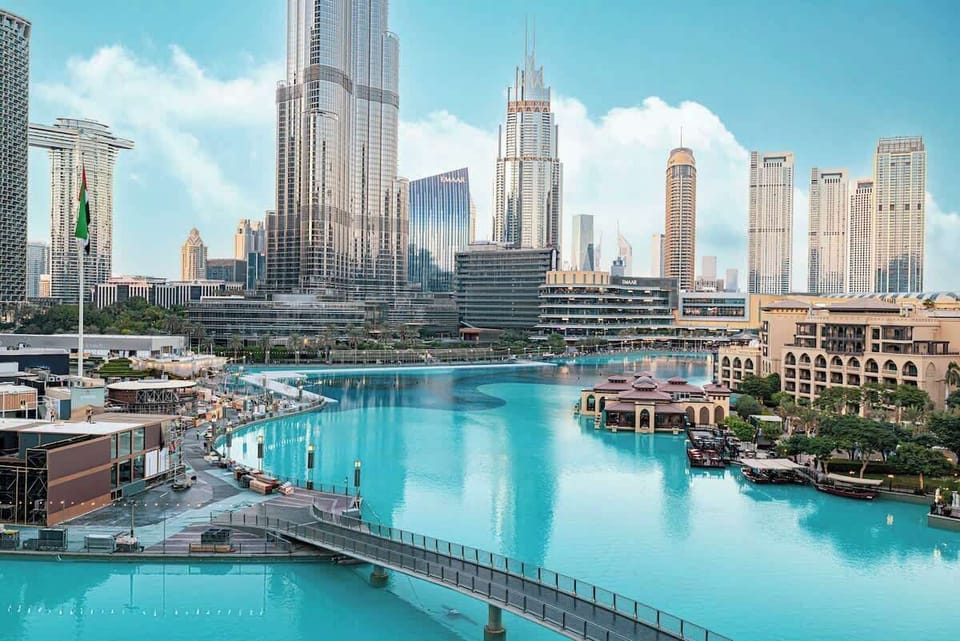 A serene city escape with fountain views, stylish seating, and unforgettable panoramas