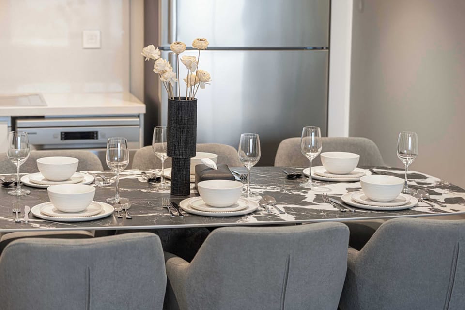 Chic dining space, perfect for enjoying home-cooked meals or takeout