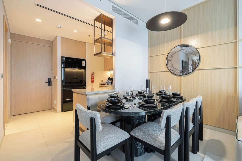 This open dining area feels expansive and connected, perfect for lively conversations and shared meals in a light-filled environment