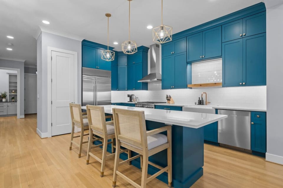 Fully Stocked Kitchen Open To Living Space + Dining Room