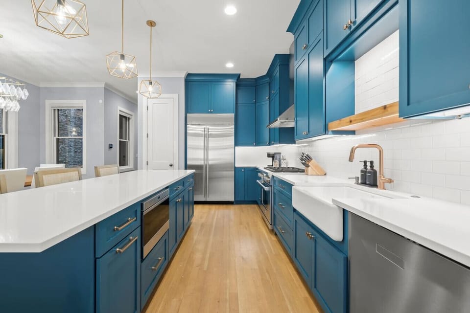Fully Stocked Kitchen Open To Living Space + Dining Room