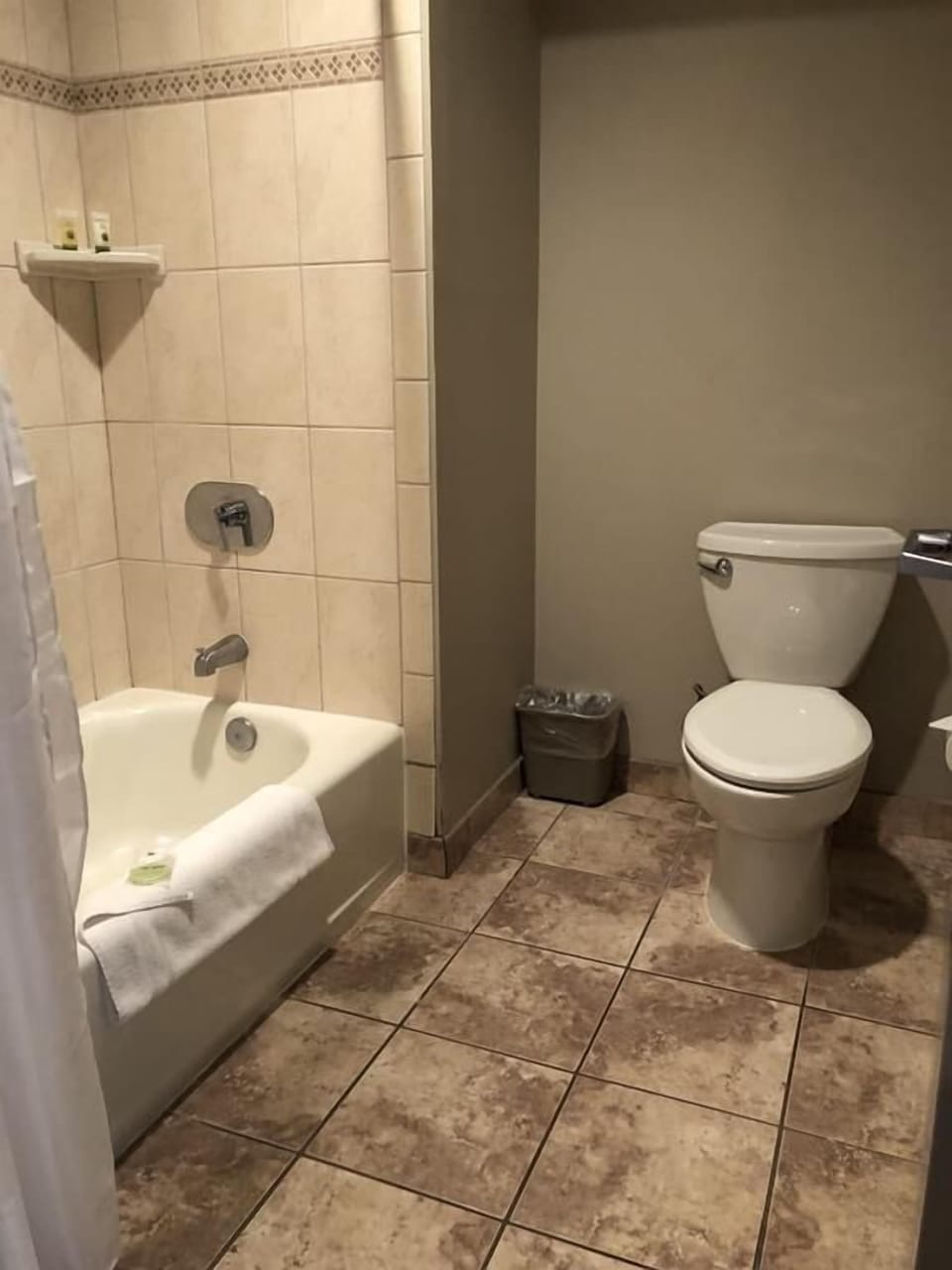 Refresh with a clean, tiled bath and easy tub-shower combo.