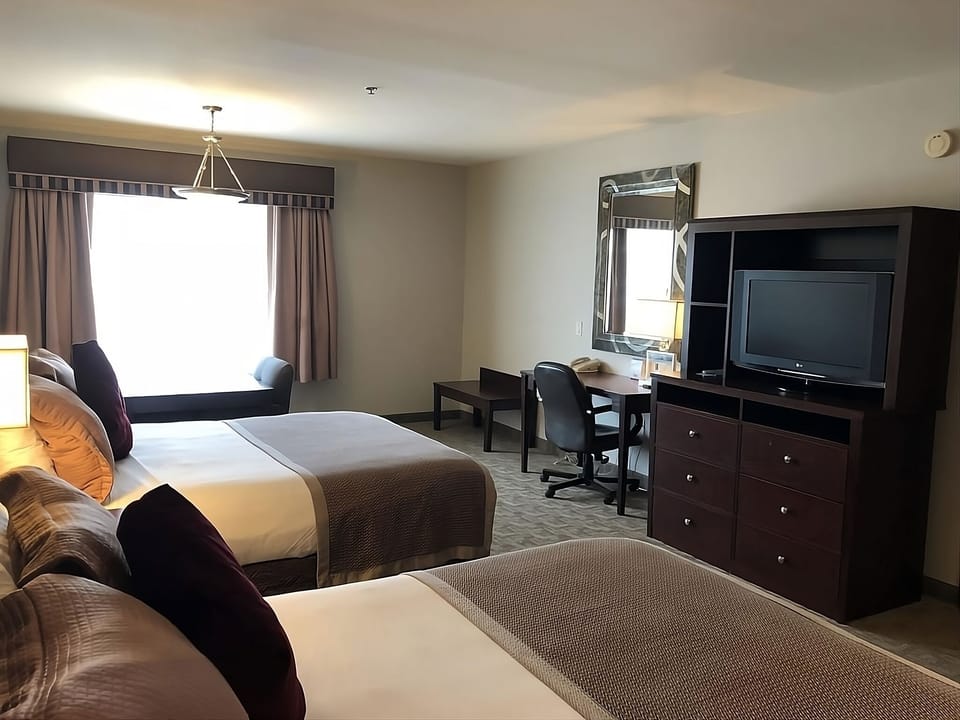 Kick back with in-room entertainment and daylight by the window.