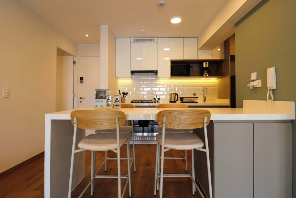 Modern kitchen island with seating, perfect for casual meals or coffee.