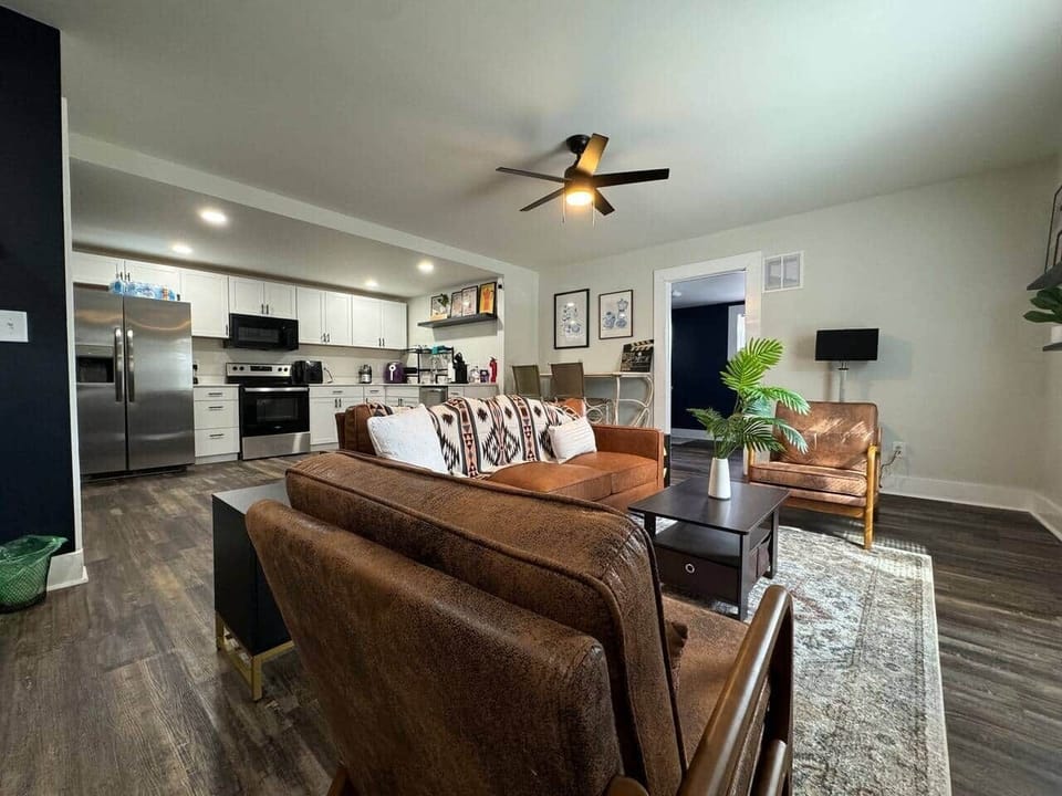Our living room is designed for comfort and relaxation, featuring cozy sofas and table and tasteful decor and plenty of space to unwind after a day of exploring.