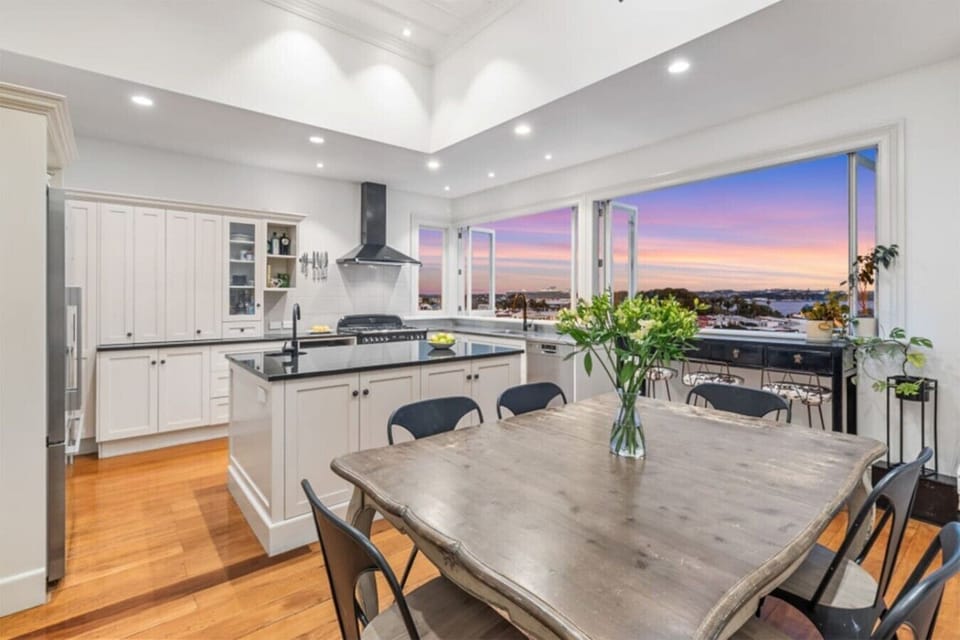 Open kitchen flowing into dining area