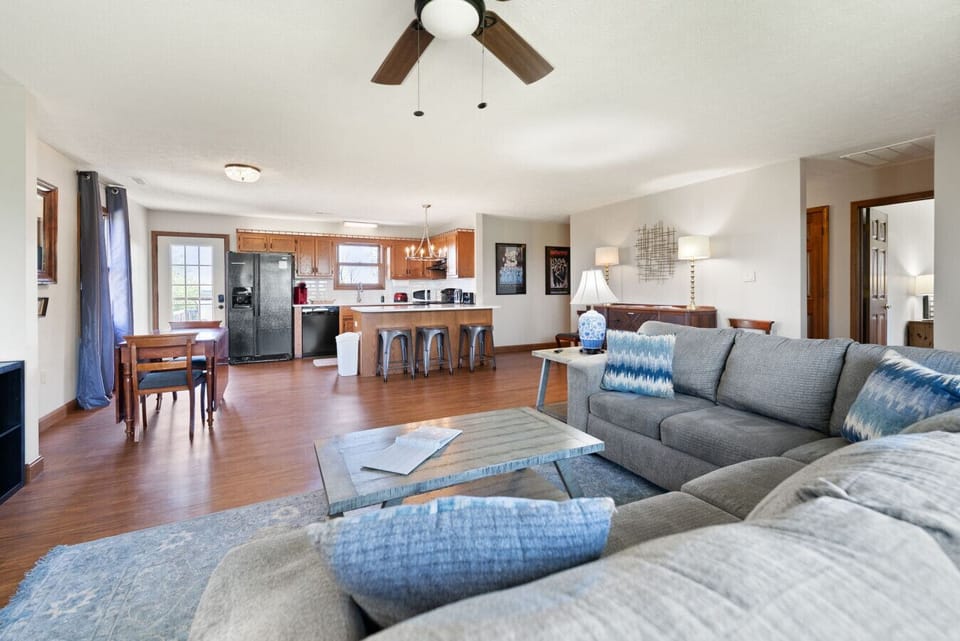 Living Room | Sectional Sofa | Ceiling Fan & Kitchen View