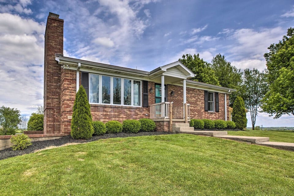 Property | Brick Exterior | Sloped Lawn Setting