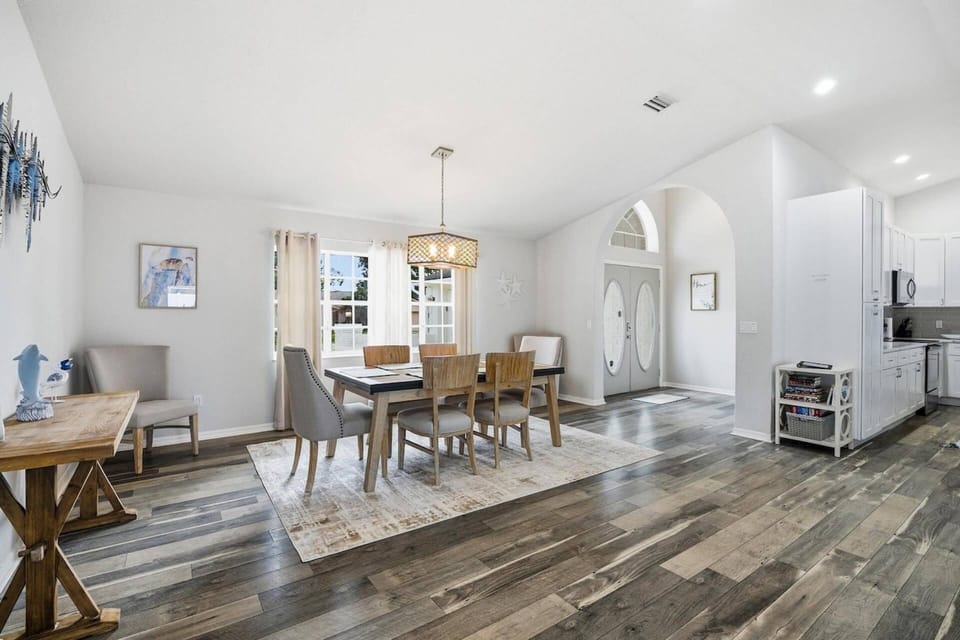 Gather together for meals, games, or conversation in a welcoming dining space designed for family connection and vacation memories.