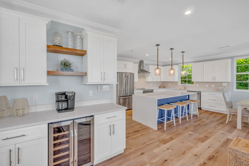 Beautifully updated kitchen with modern finishes and seamless flow to the wet bar, dining and coastal living area. Designed for guests seeking high-end Marathon FL vacation rentals with private amenities and resort-style comfort.