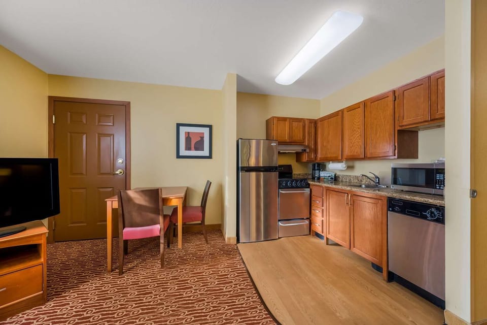 Cook simple meals easily with full-size fridge and stove.