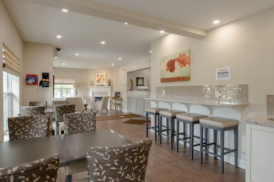 Gather for meals and stories around the spacious dining table.