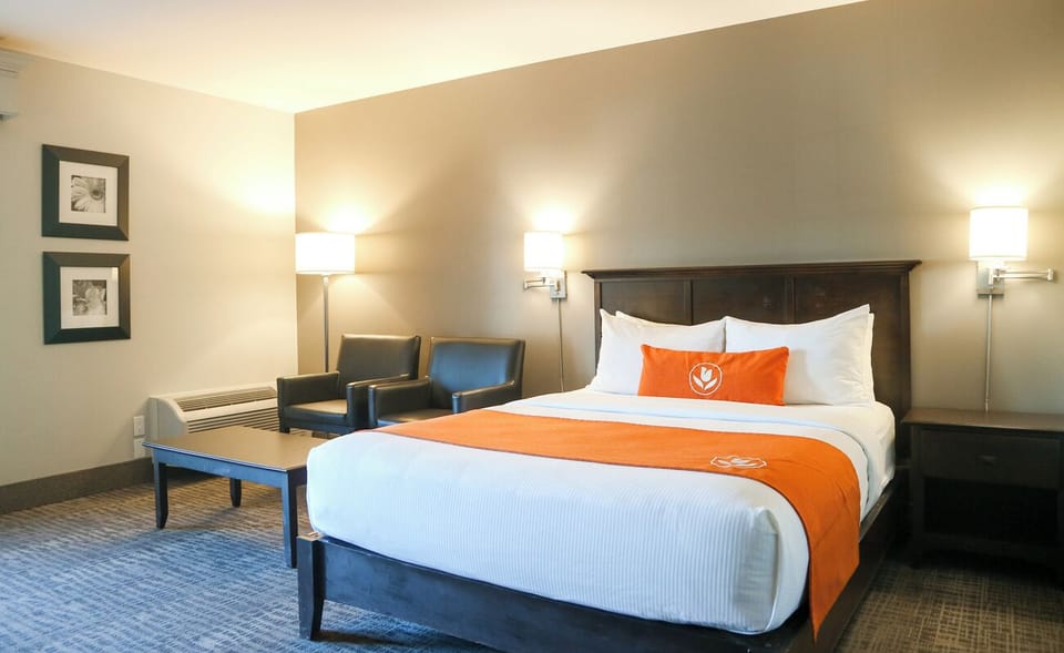 Stretch out on crisp linens in a calming, roomy retreat.