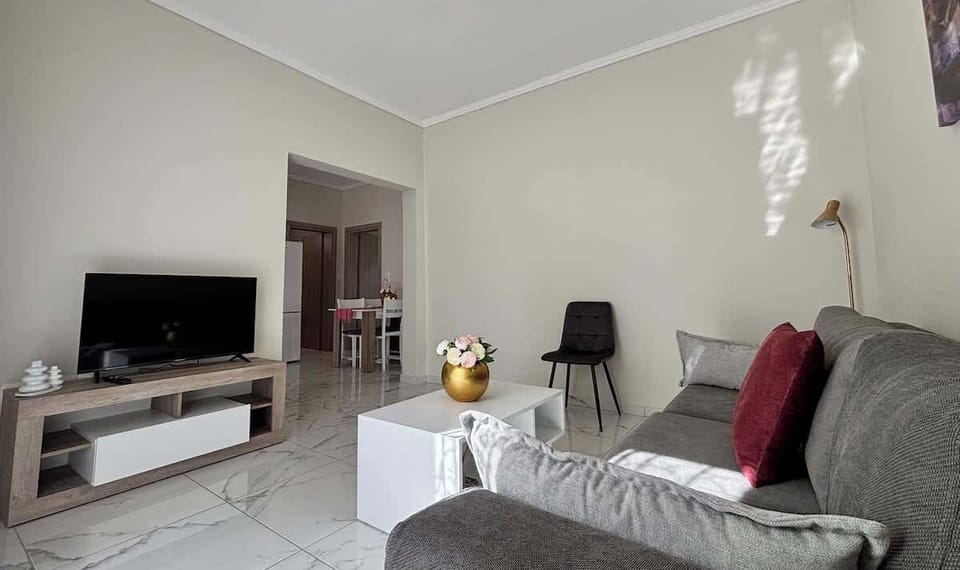 Modern Living Room with Marble Floors and Smart Layout
