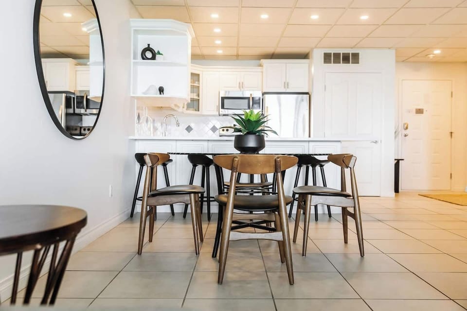 Whip up delicious meals or enjoy a morning coffee at our stylish, fully-equipped kitchen with a convenient breakfast bar. Perfect for casual dining and entertaining!