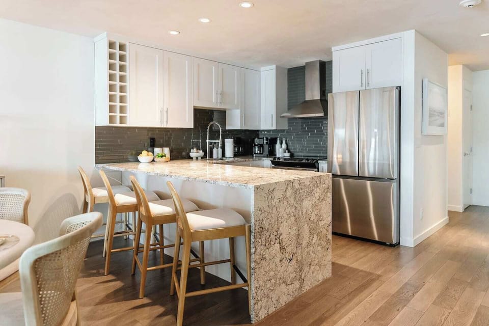 A stunning blend of style and function—this beautiful kitchen is the heart of the home.
