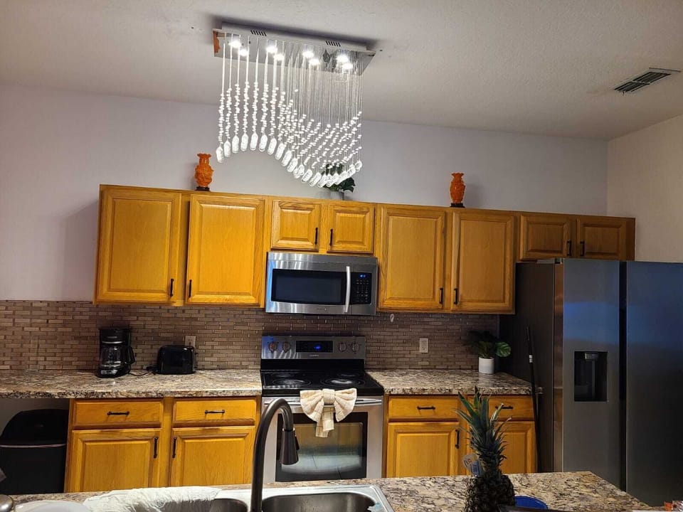 Bright kitchen conveniently located near the dining area.