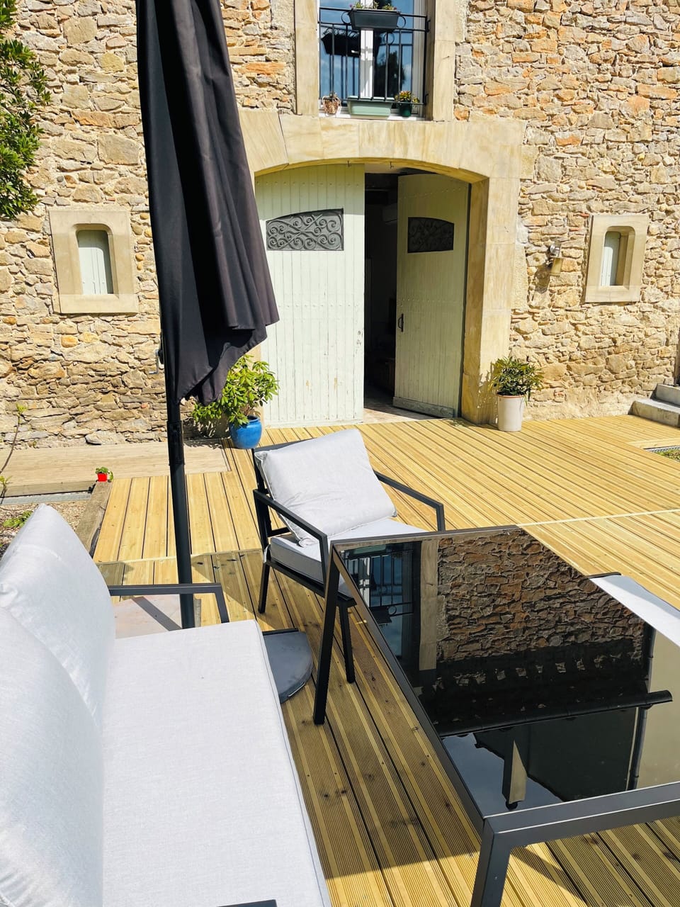 Newly decked patio area out of the front of the property.