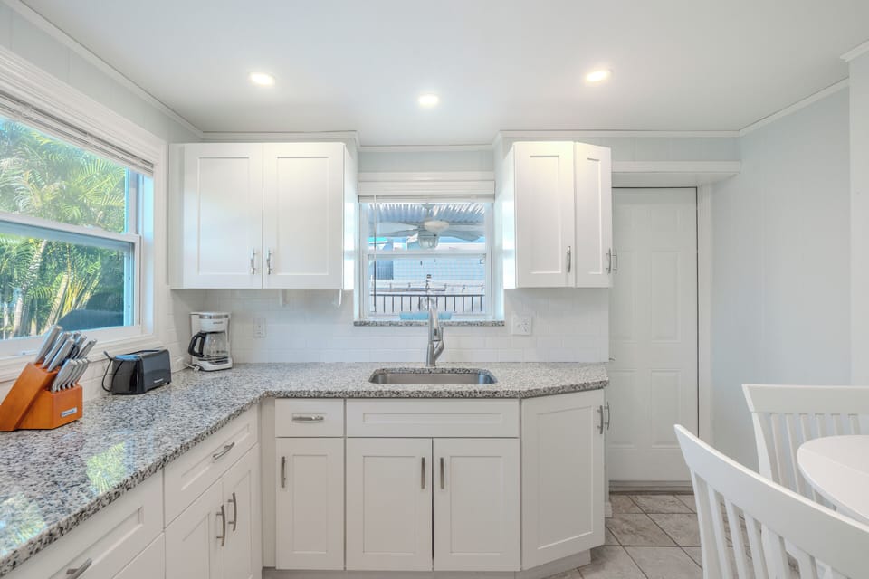 Kitchen has all essentials for your stay.