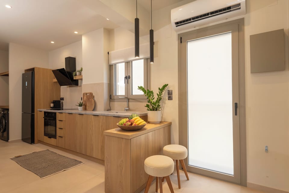 Bright & airy open-plan living and dining area, blending comfort and character.