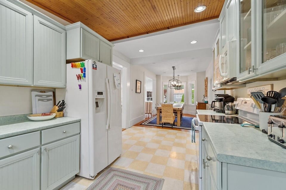 The kitchen opens up to a beautiful dining area (seats 10)
