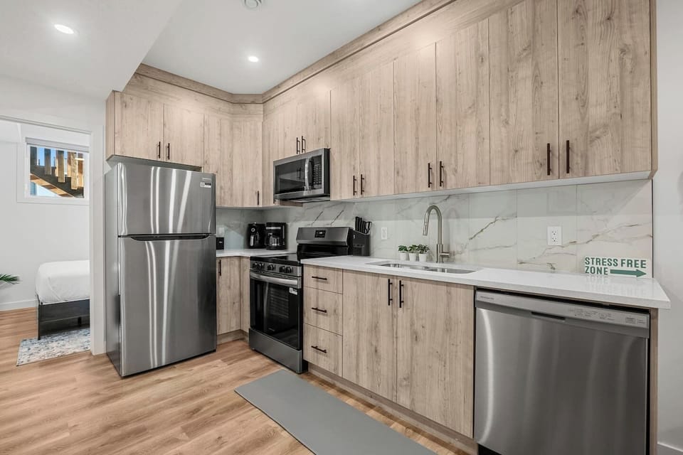 Full kitchen with am air fryer, drip coffee maker,  ground coffee, tea, sugar and basic condiments (ketchup, mustard and relish.)