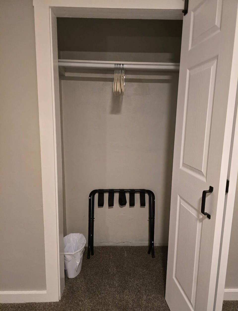 Closet with bi-fold barn door