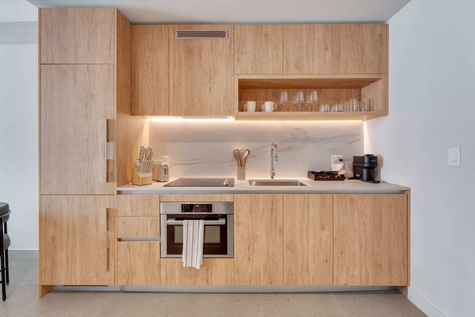 Fully equipped modern kitchen with stainless appliances