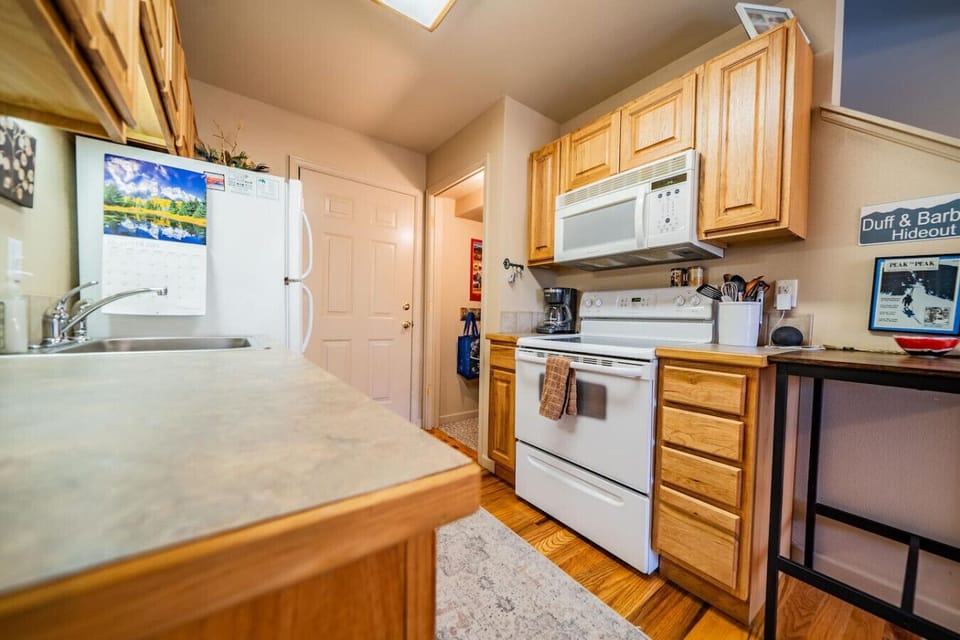 Kitchen with fridge, microwave, and everything you need!