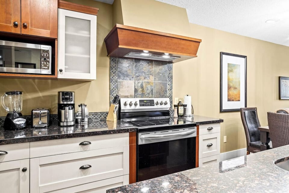 Enjoy hassle-free meal preparation in our modern kitchen fully-equipped with modern appliances and basic cooking essentials.