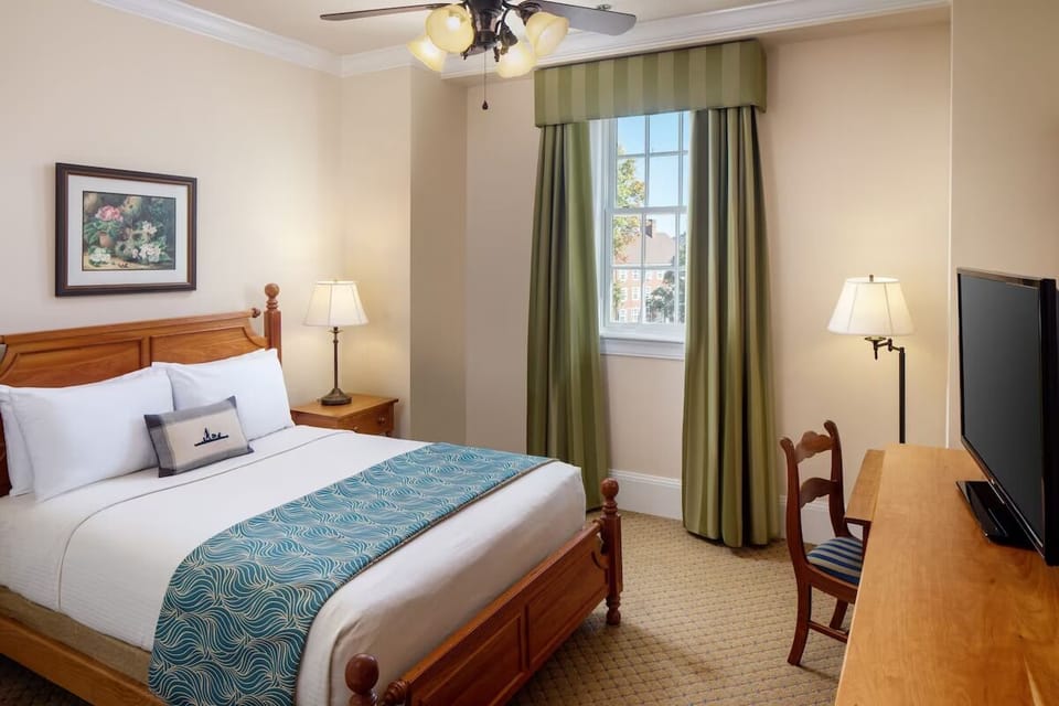 Settle in with a serene king bed and a dedicated workspace.