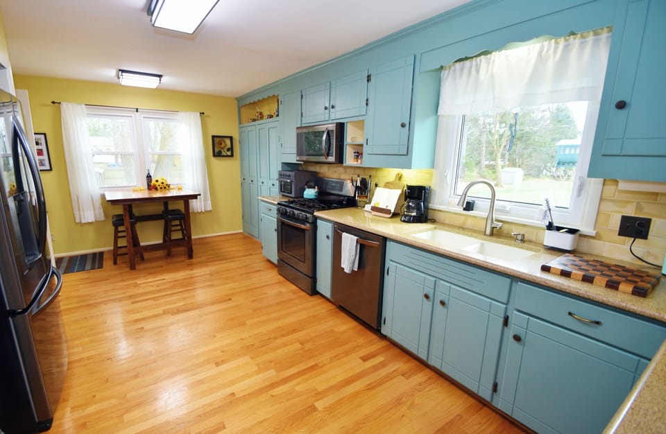 You can bring that square table to the dining room for a huge extension table.