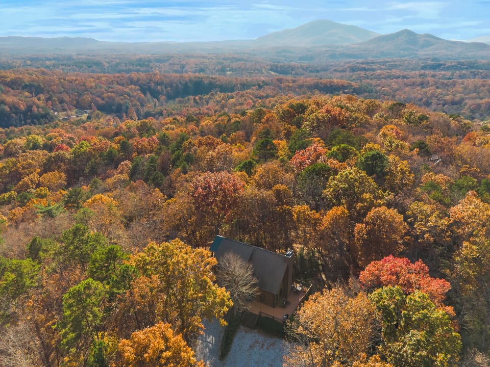 Tucked away in the trees, with miles of fall color all around.