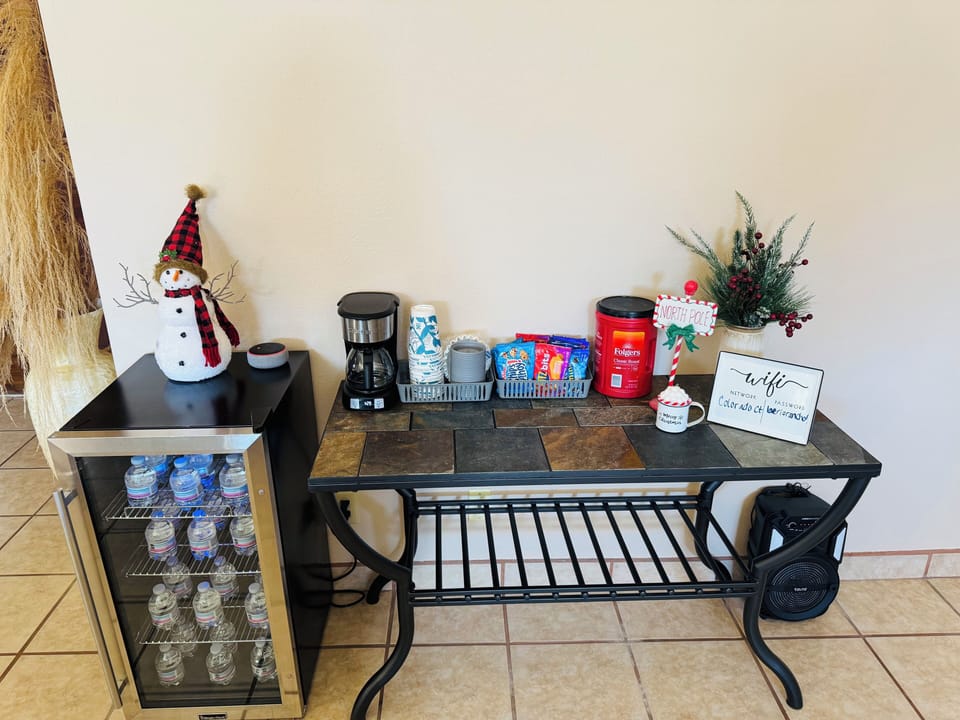 Coffee table w/ complimentary snacks and water.