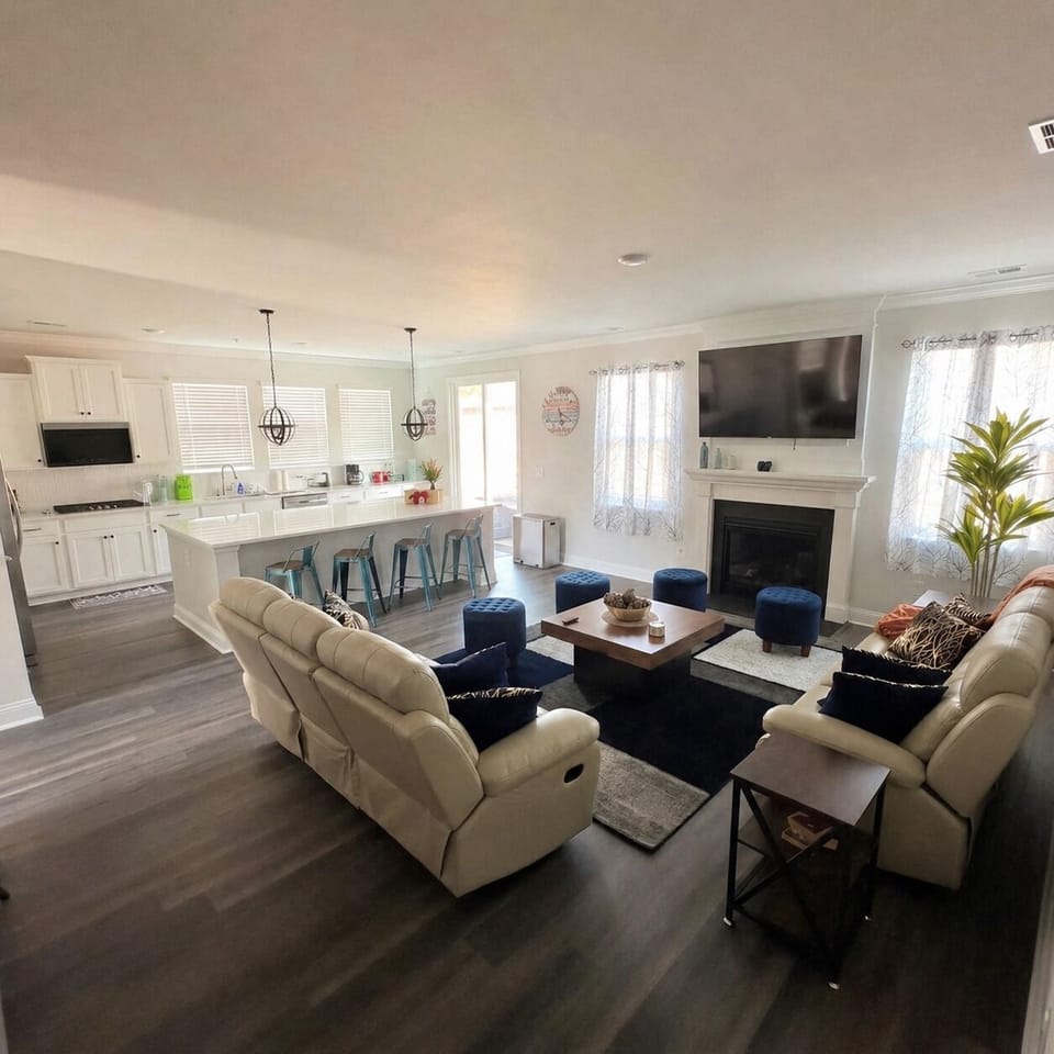 Living Room: Bright and airy space with comfy seating, perfect for laughter and memories!