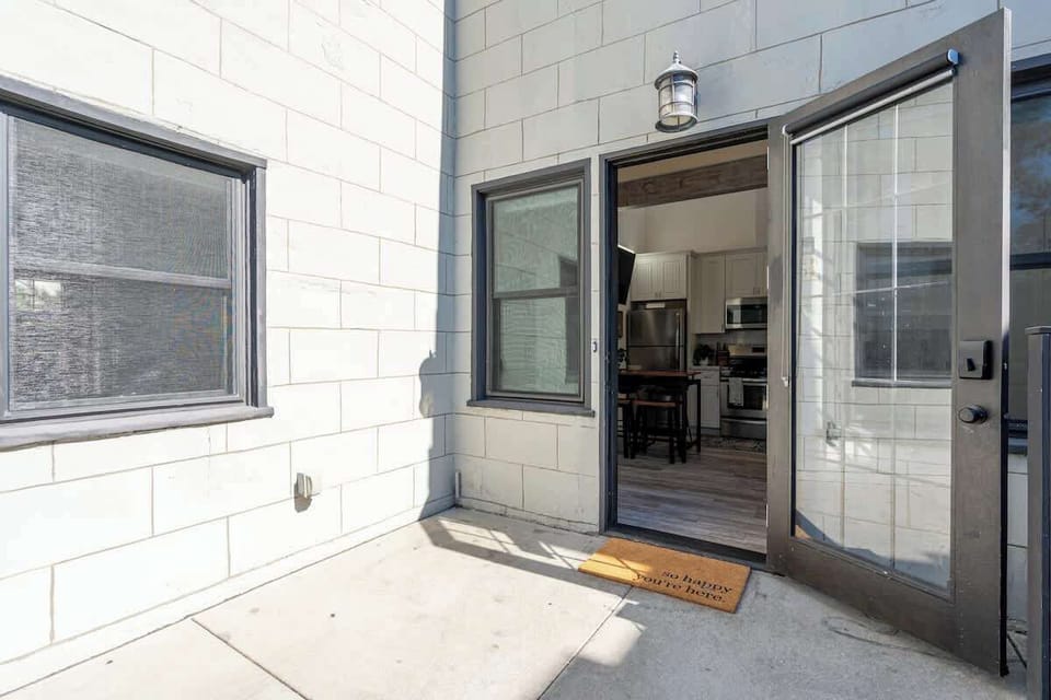 The front entrance boasts a charming patio area.