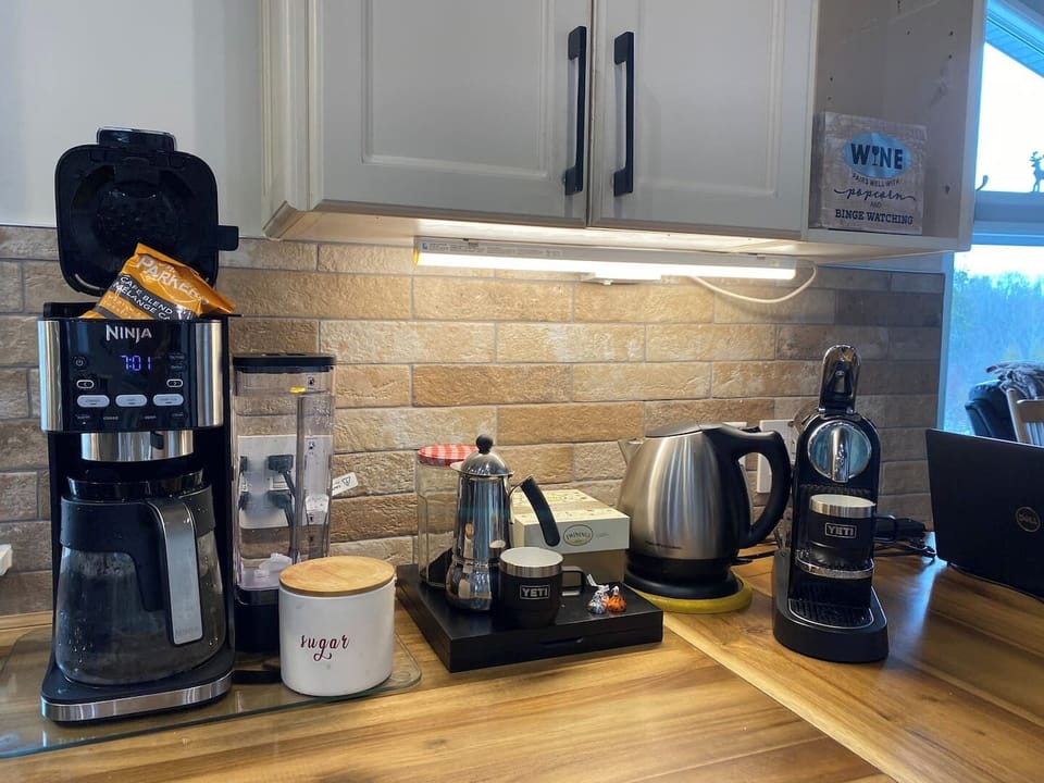 Enjoy the amenities throughout your stay: Mother Parker's Coffee, Nespresso pods, herbal teas, sugar, sweeteners, and local honey  all complimentary for your entire stay! 