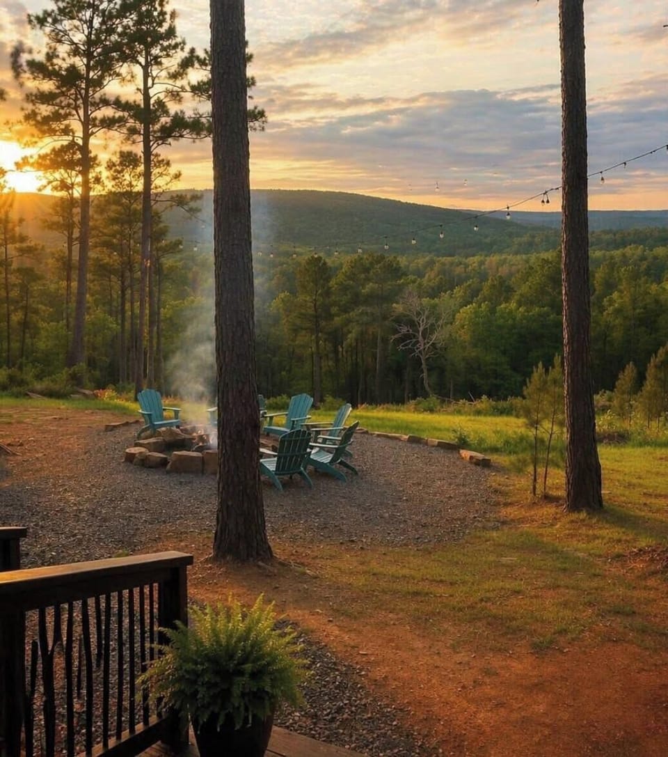 Experience breathtaking sunset vistas and cozy evenings by the fire at this serene mountain escape.