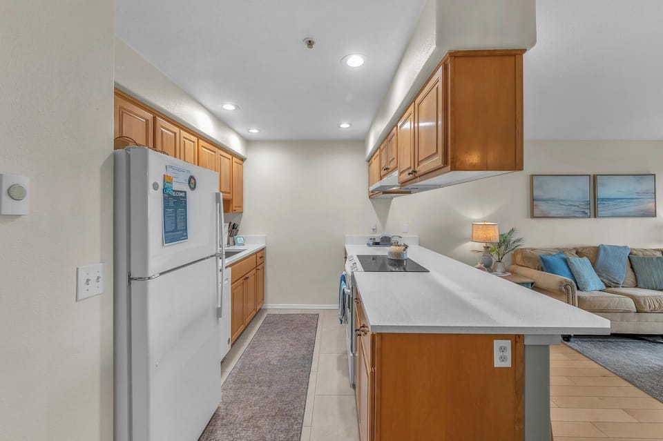 Your fully equipped kitchen offers everything needed to prepare meals, with modern appliances and ample counter space for cooking adventures.
