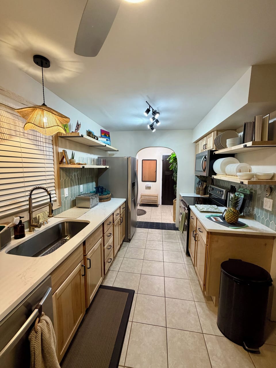 Hickory cabinets, quartz counters, stainless appliances & double oven.