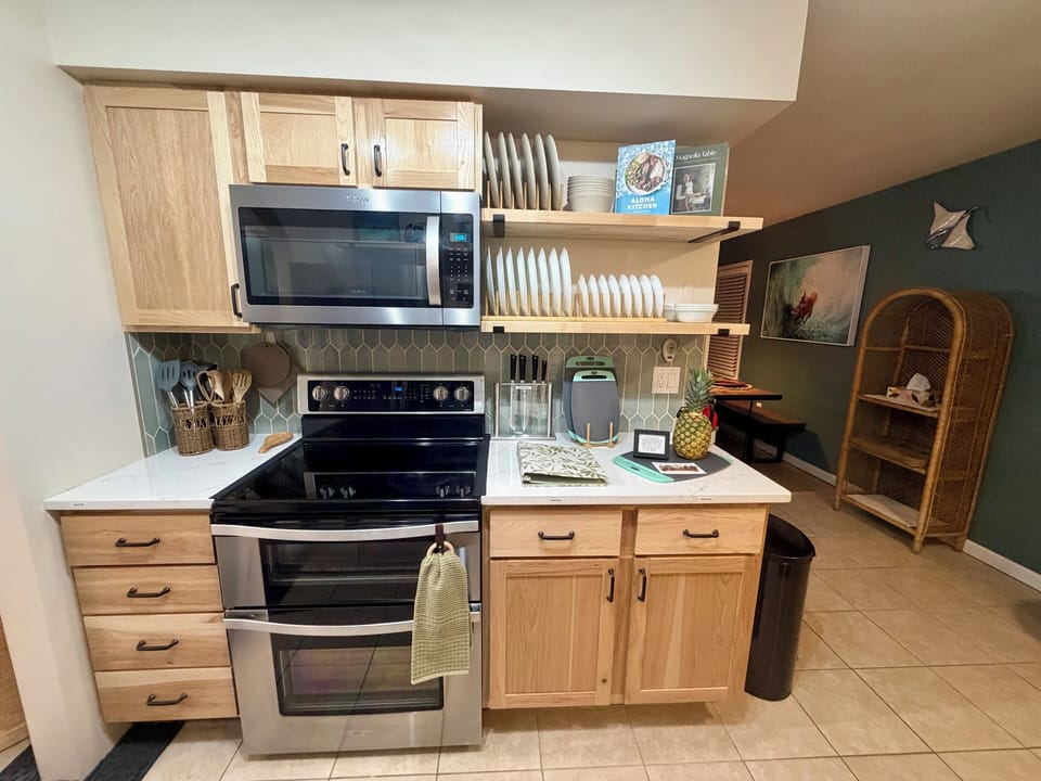 Hickory cabinets, quartz counters, stainless appliances & double oven.