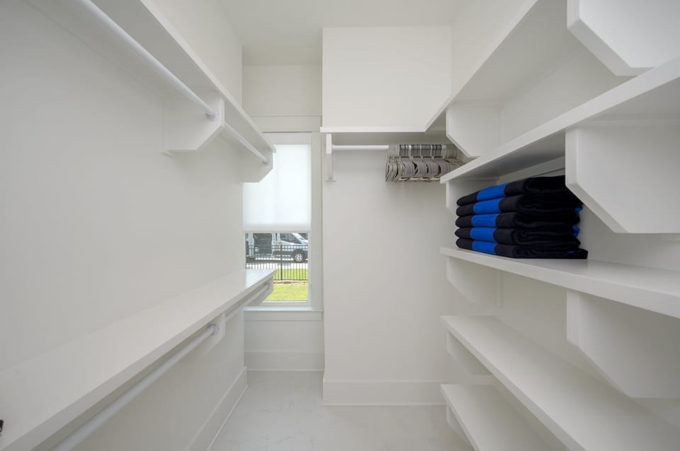 First Floor - Guest Bedroom 1: King Bed, Private Bath (Soaking Tub, Separate Shower), Pool View, TV