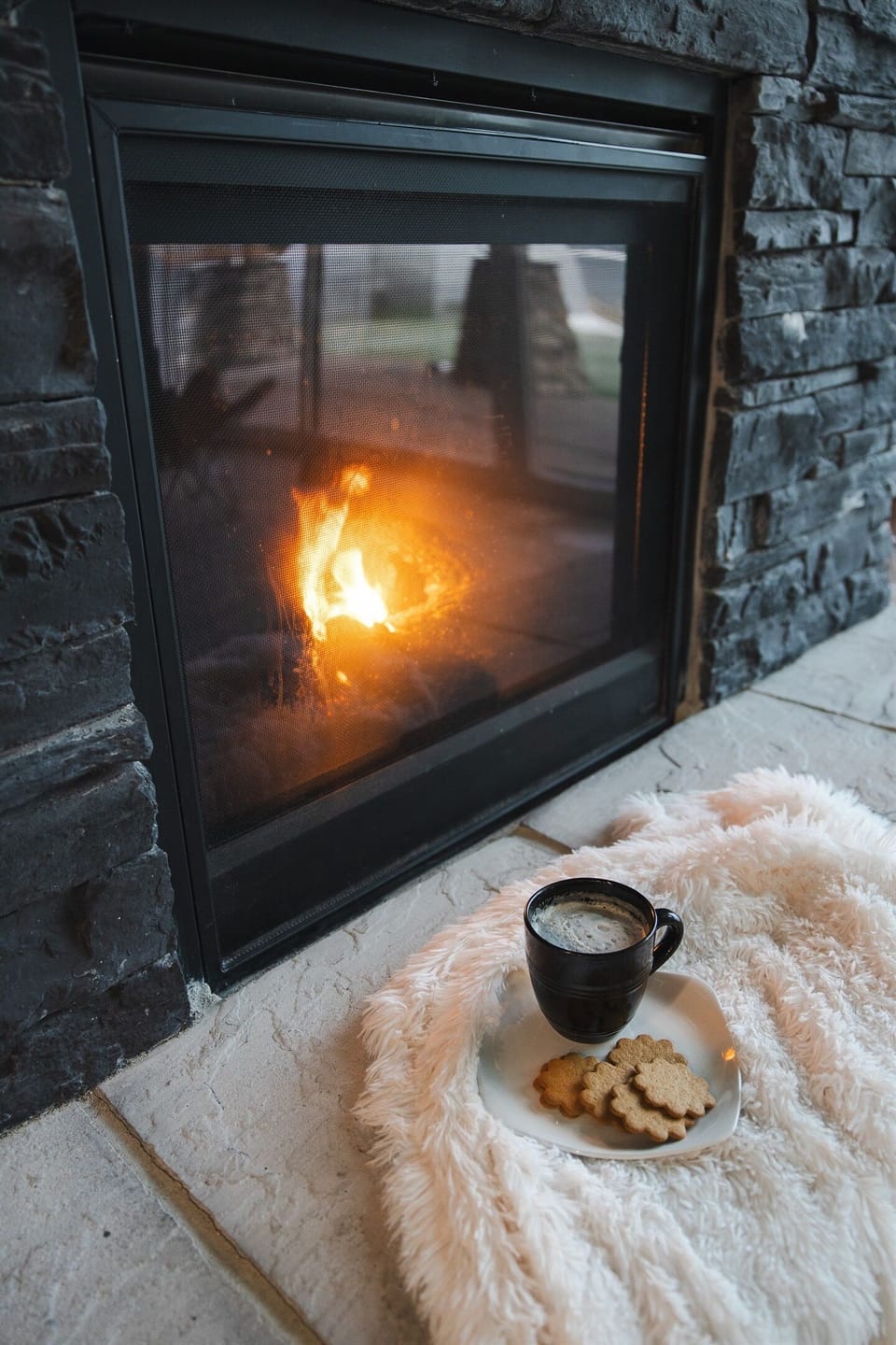 Your perfect retreat awaits warmth and serenity next to a crackling fire.