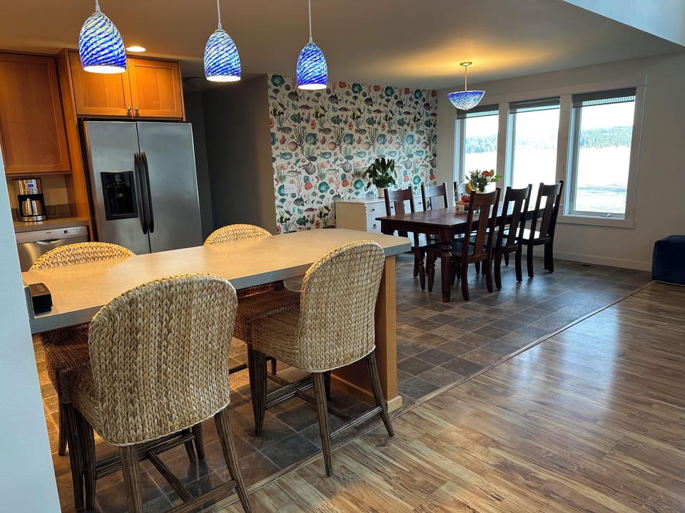 Counter seating for 4.  Open kitchen allows for conversation & game-day viewing.