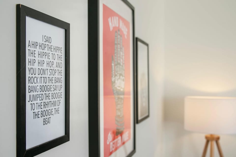 Modern wall art and décor in Long Eaton townhouse by Gough Groves