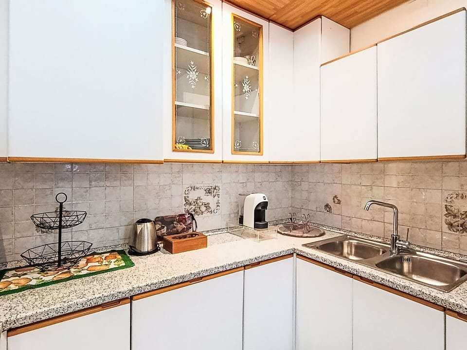 Kitchen, Kitchen Appliance, Countertop, Cabinetry, Major Appliance, Interior Design, Wood, Flooring, Kitchen Sink, Plumbing Fixture